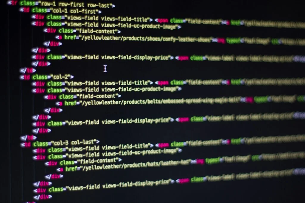 HTML source code on a dark screen.