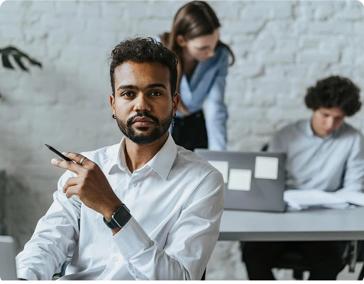 Lead engineer managing a software development team in an office