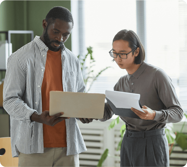 Consultants reviewing project requirements for digital transformation