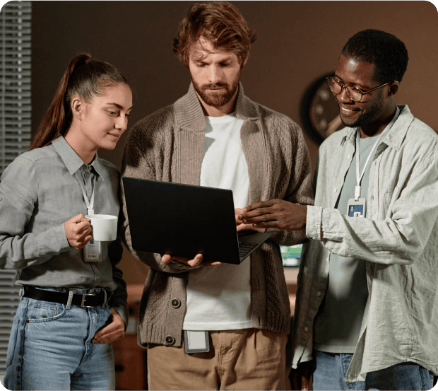 Software development team collaborating on a project review